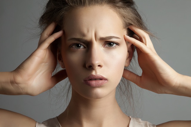 woman in stress watching at camera